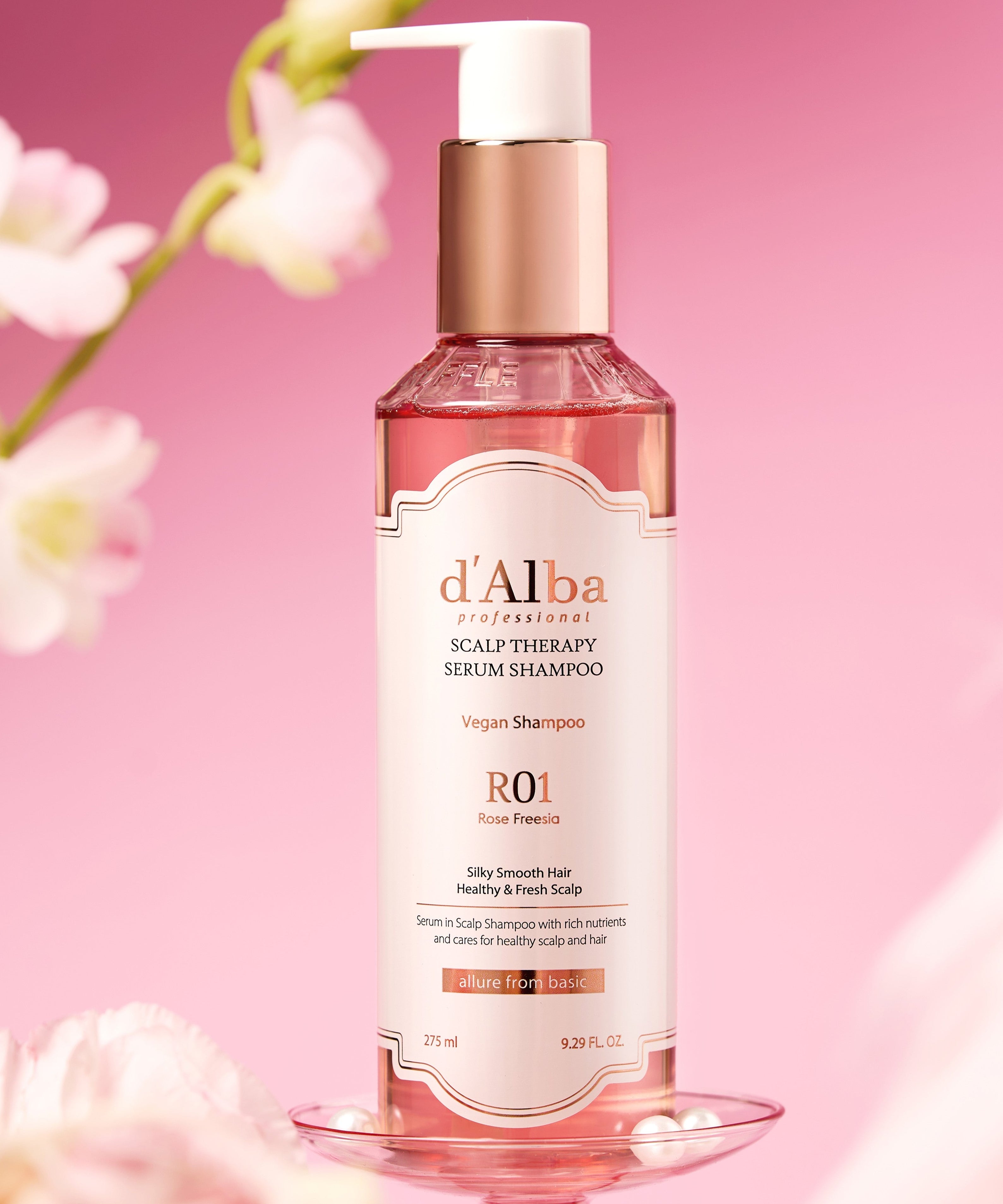 D'ALBA Professional Repairing Scalp Therapy Serum Shampoo Rose Freesia 275ml bottle on pink background with flowers