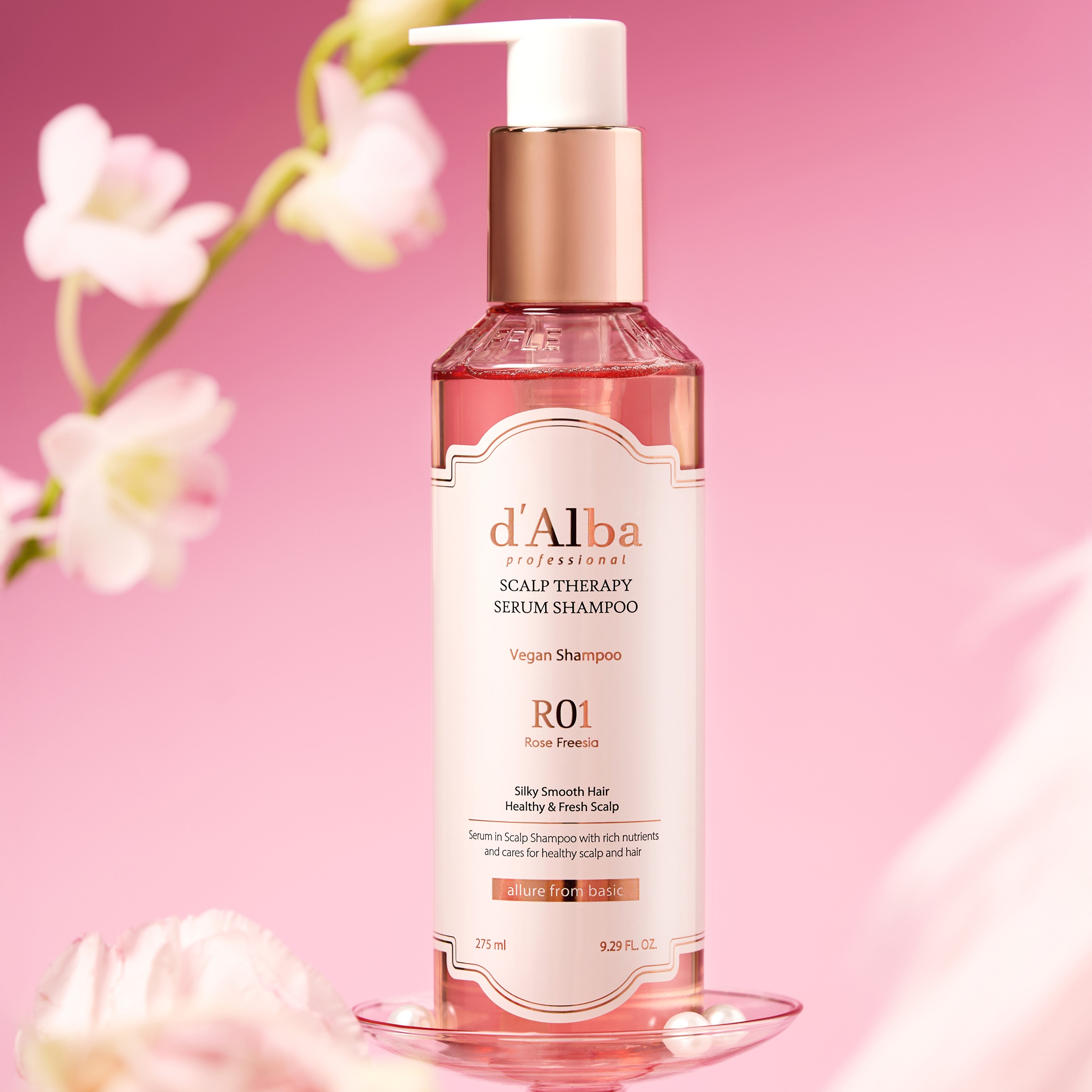 D'ALBA Professional Repairing Scalp Therapy Serum Shampoo Rose Freesia 275ml bottle on pink background with flowers