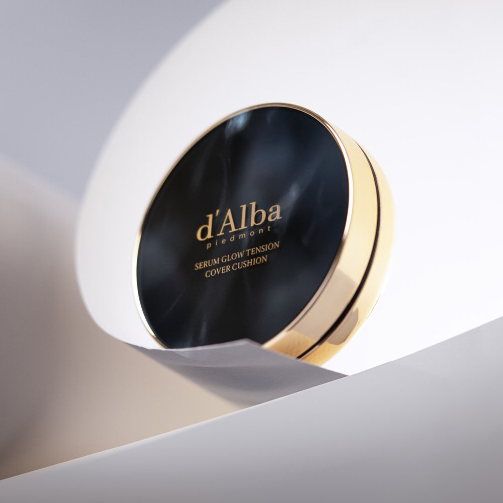 D'ALBA Serum Glow Tension Cover Cushion compact showcasing sleek packaging design.