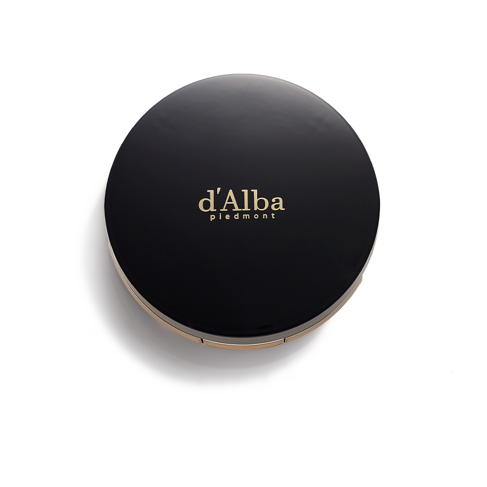 Black compact case of D'ALBA Skin Fit Grinding Serum Cover Pact with elegant gold lettering on the lid.