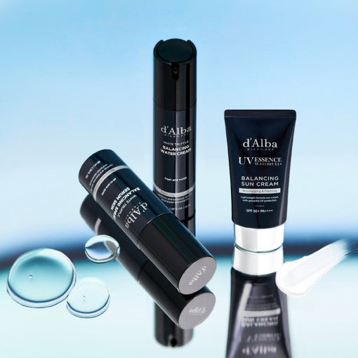 D'ALBA Vegan Men Set (Skin 80ml, Cream 50ml, Suncream 50ml) - Gentleman Korea product image showing black bottles and tube on reflective blue surface
