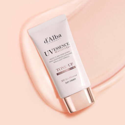 D'ALBA Vegan Waterfull Pink Tone-Up Suncream product packaging on a soft pink background.