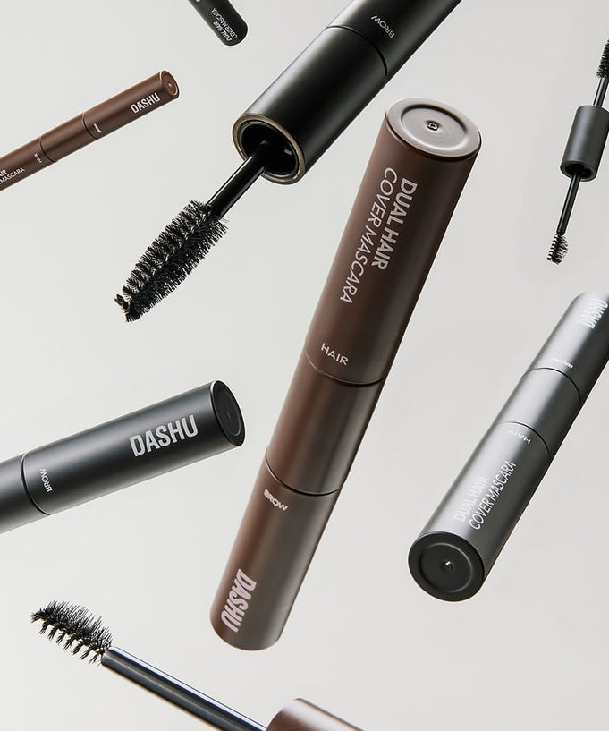 DASHU Daily Dual Hair Cover Mascara displayed with various brushes for hair application.