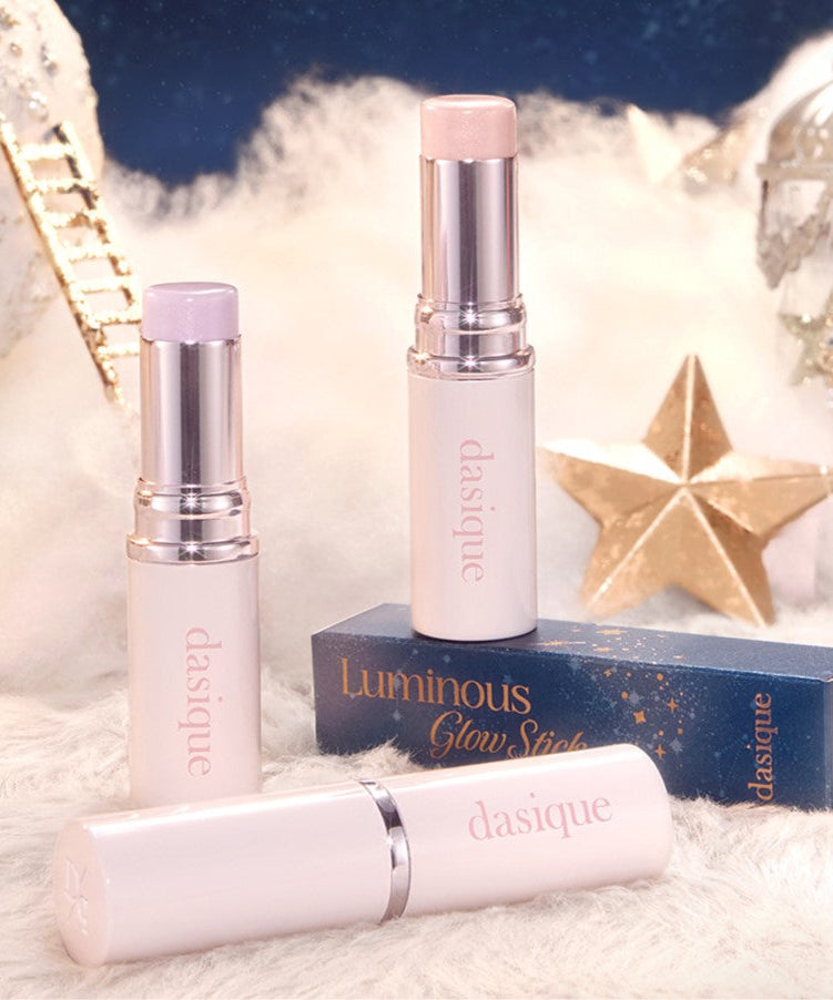 DASIQUE Luminous Glow Stick displayed on a festive background with golden stars and packaging