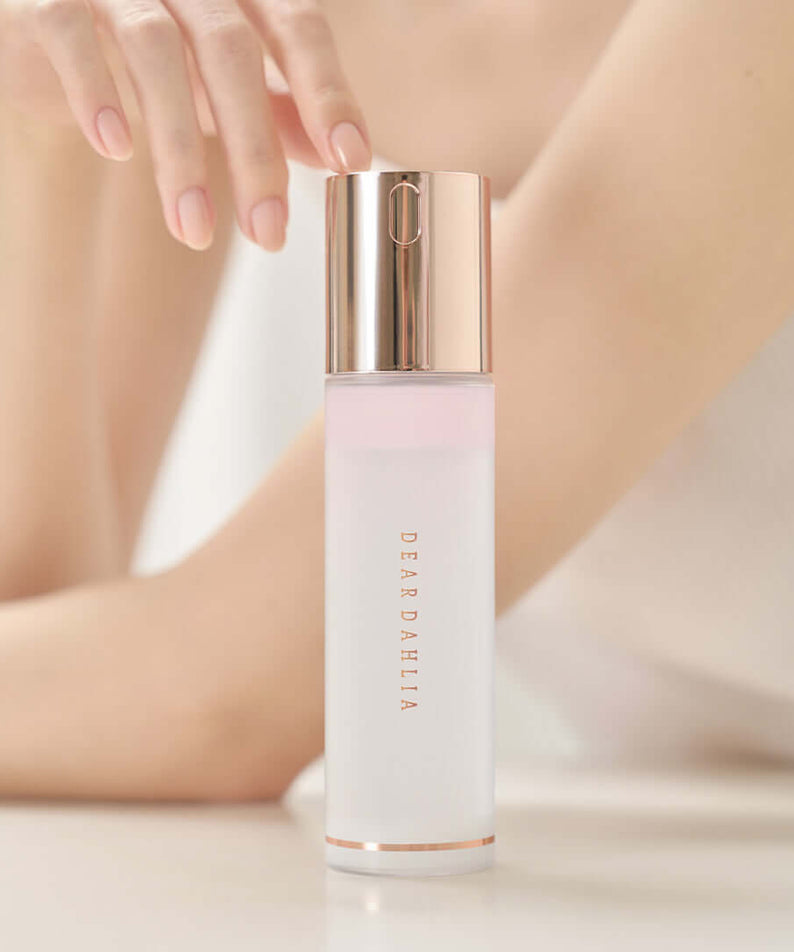 DEAR DAHLIA Endless Skin Cream Mist bottle displayed on a table.