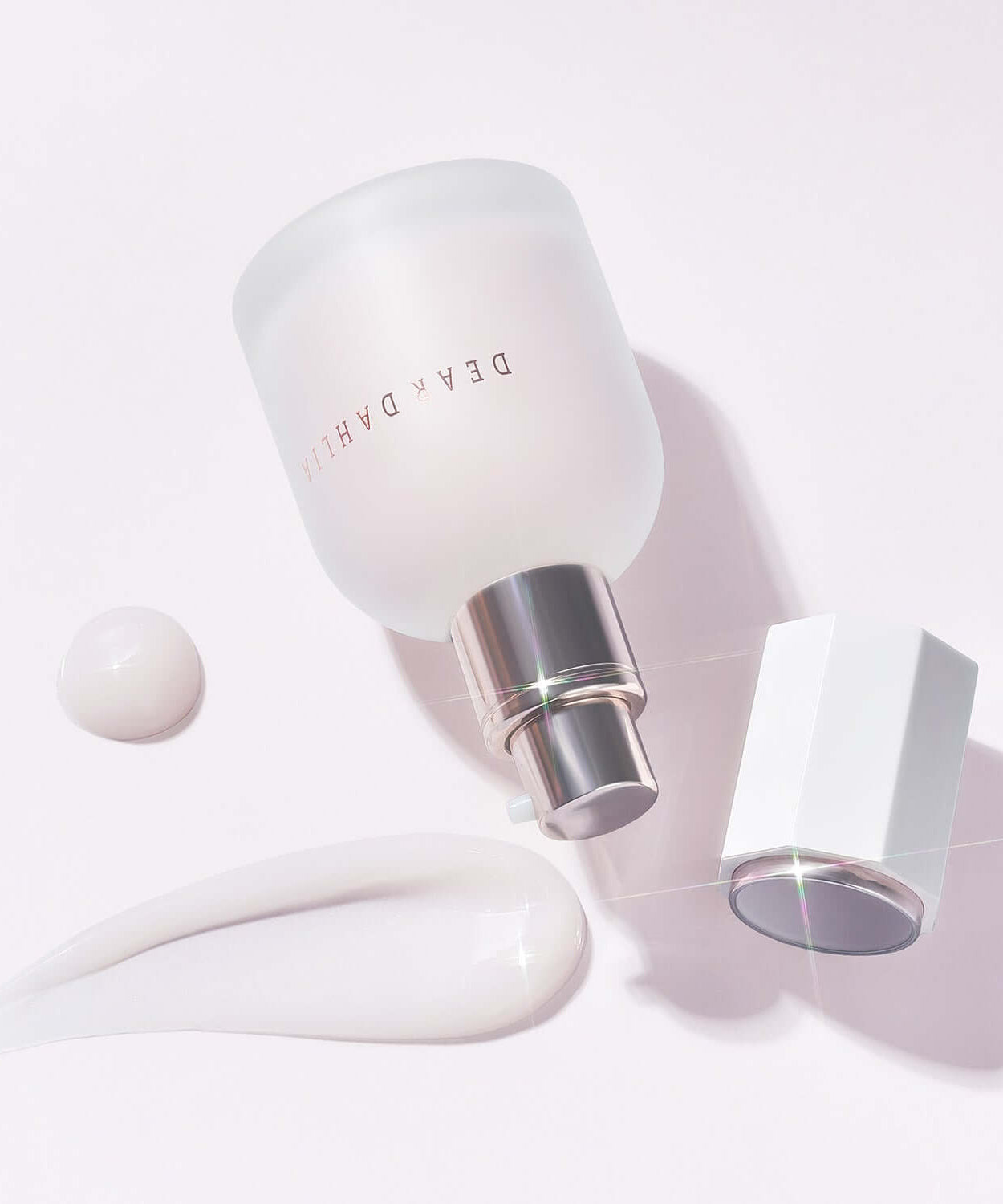 DEAR DAHLIA Prime Layer Skin Prep product with open cap and creamy texture on a light surface.