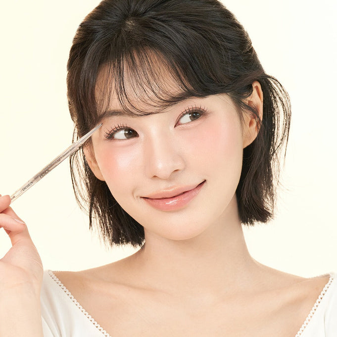 Woman using DEAR.A 0.9mm Eyebrow pencil for precise eyebrow definition