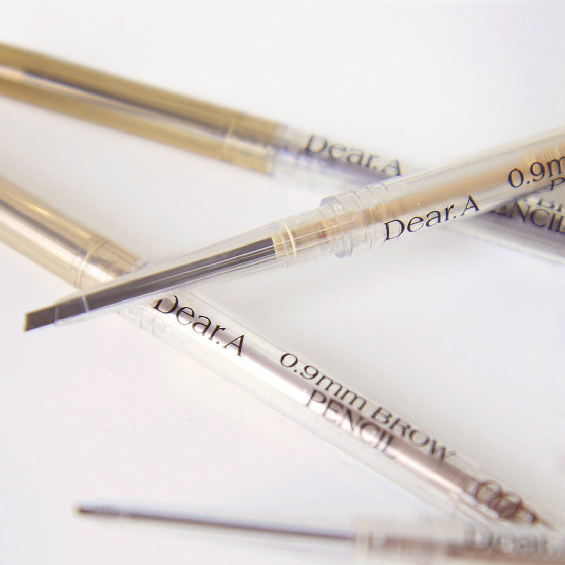 Close-up of DEAR.A 0.9mm Eyebrow pencil showing fine tip and product details.