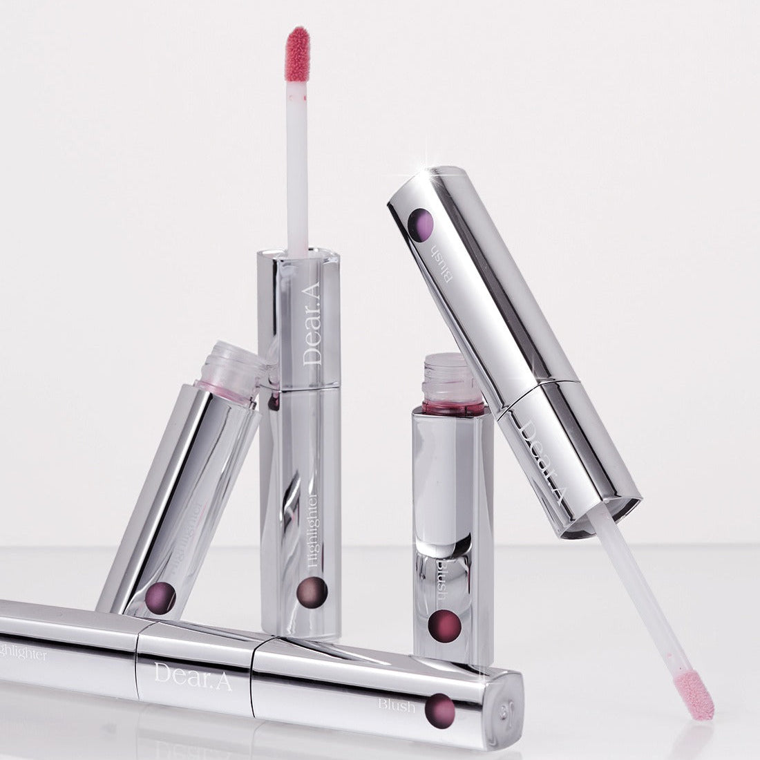 DEAR.A Blush & Beam Dual Stick makeup with sleek design and pink hues for vibrant beauty looks.