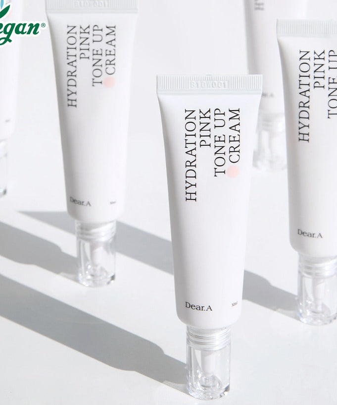 DEAR.A Hydration Pink Tone-Up Cream 30ml tubes arranged on a white surface, highlighting vegan-friendly skincare product.