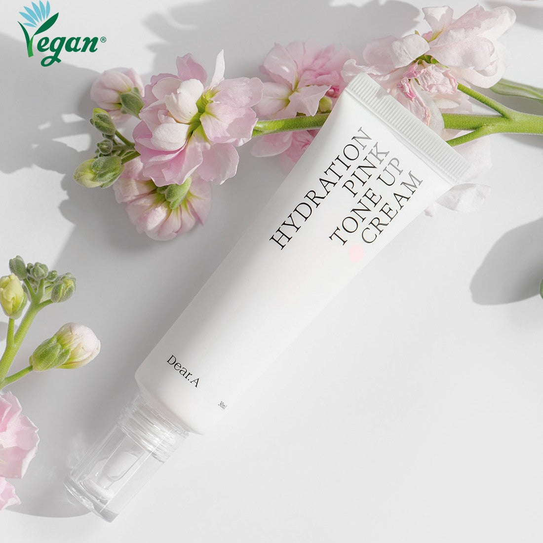 DEAR.A Hydration Pink Tone-Up Cream 30ml tube with floral background, vegan skincare