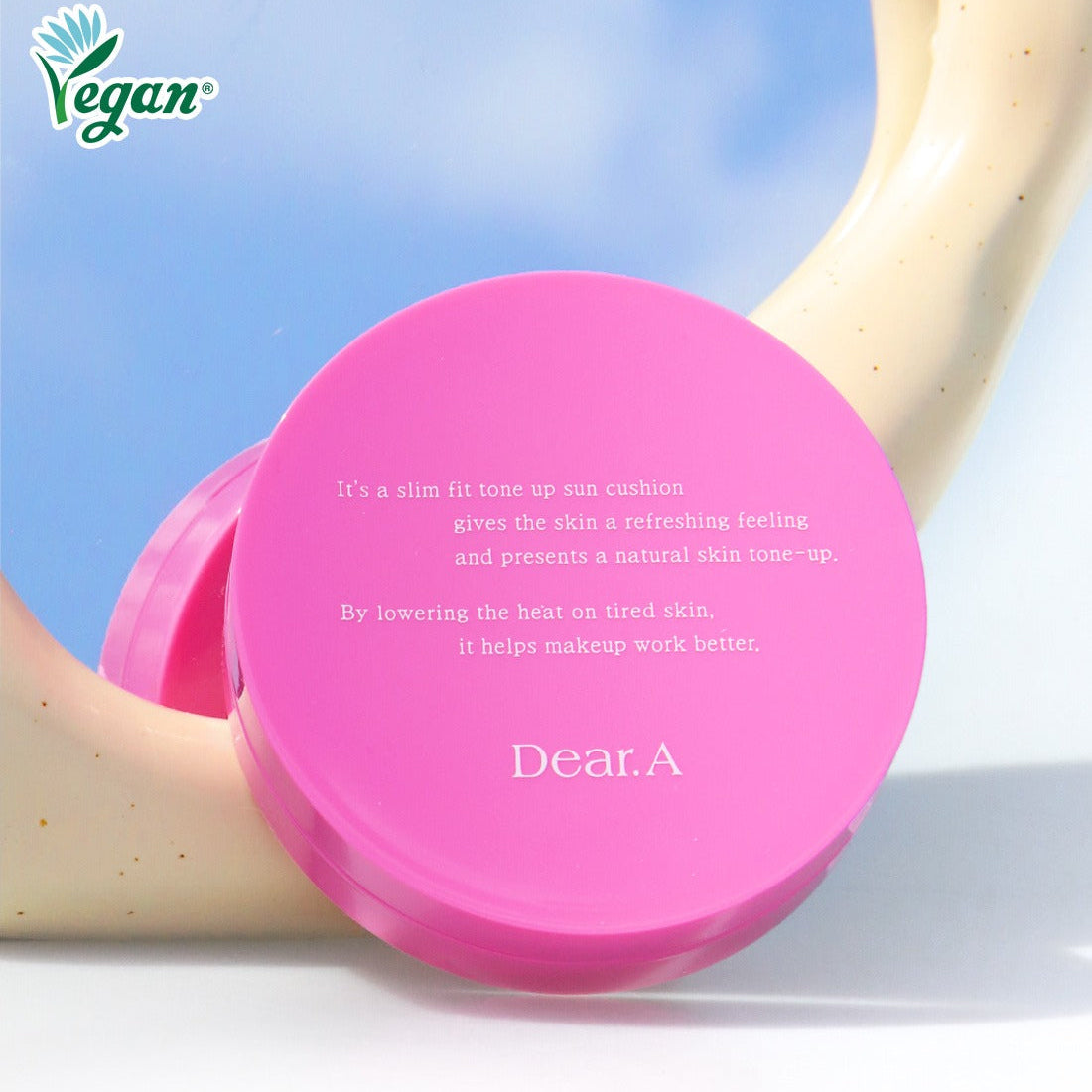 DEAR.A Slim Fit Tone-Up Sun Cushion 30ml with vegan certification on a ceramic hand stand