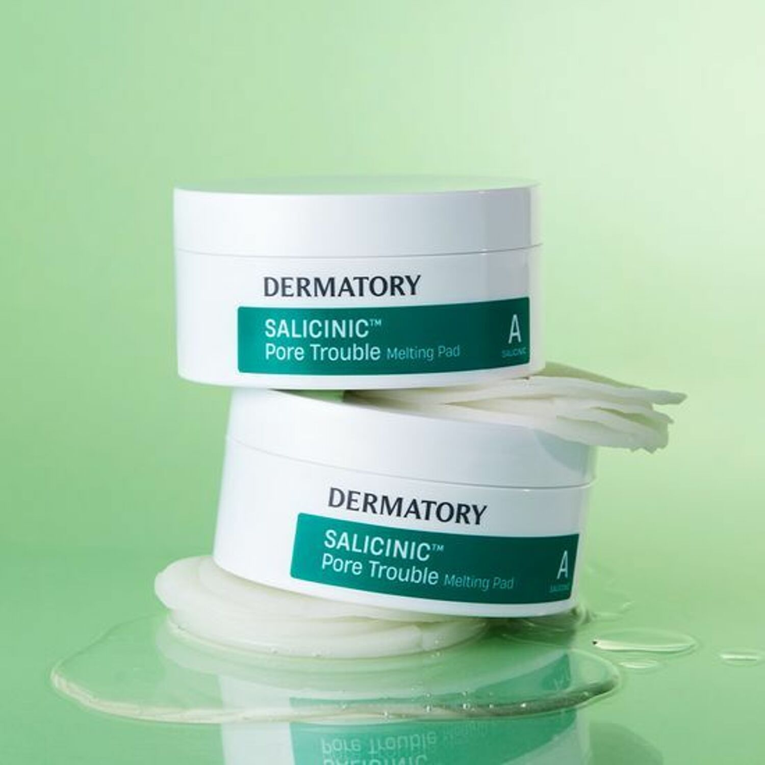 DERMATORY Salicinic Pore Trouble Melting Pad 30 Sheets stacked with pads on green background