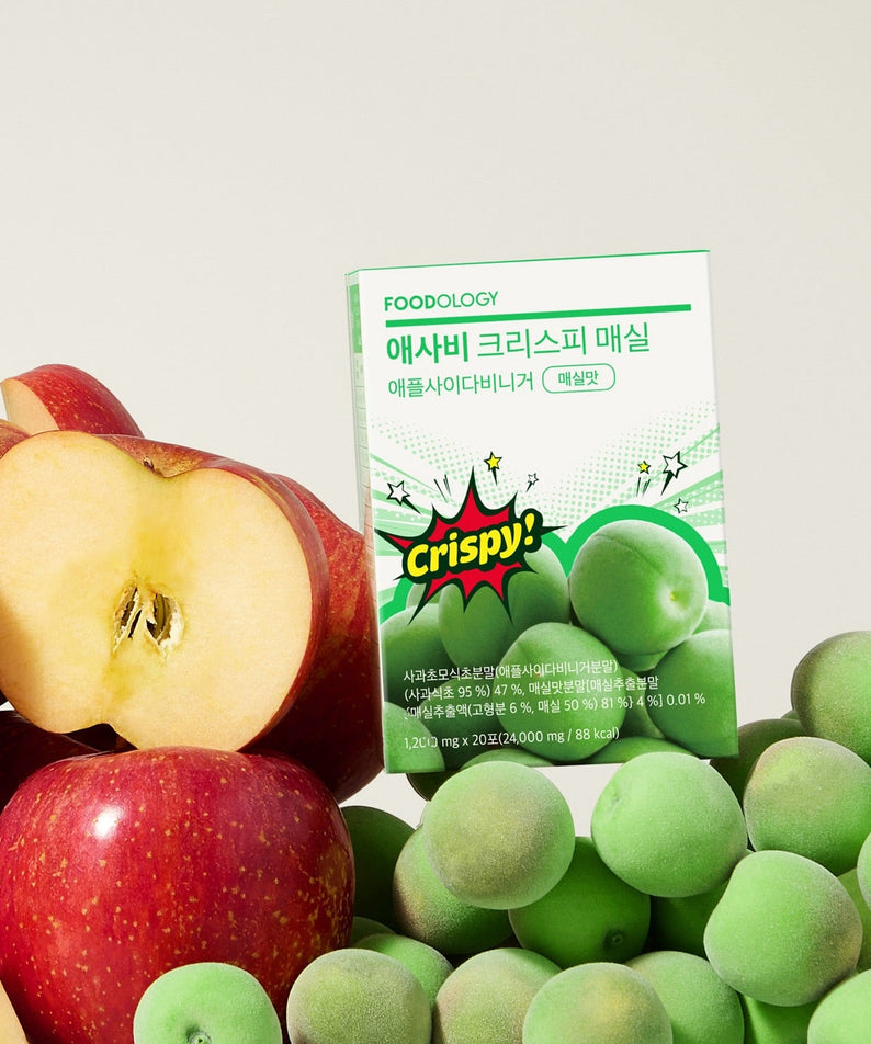 FOODOLOGY Asabi Crispy 3 Types box surrounded by green and red apples, showcasing the product packaging.