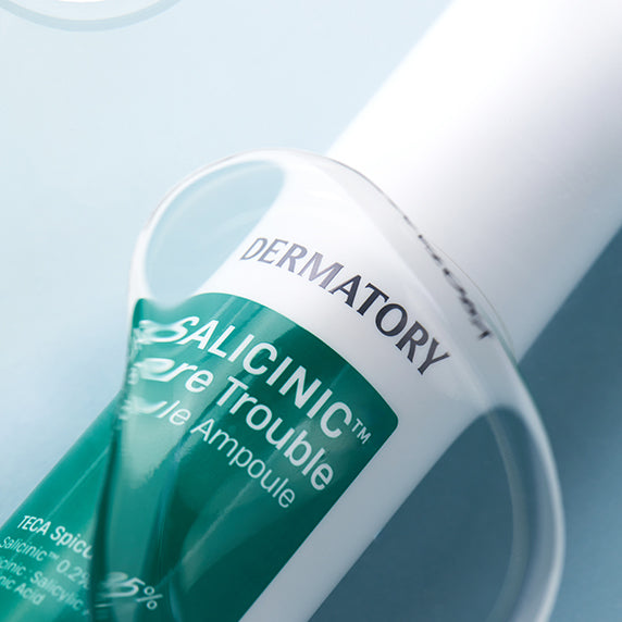 DERMATORY Salicinic Pore Trouble Spicule Ampoule 50ml bottle close-up on light blue background