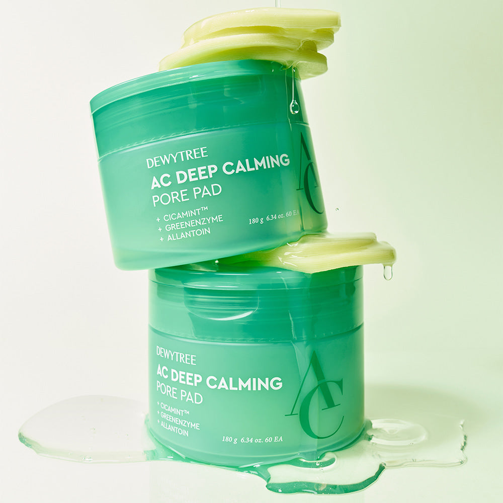 Stacked containers of DEWYTREE AC Deep Calming Pore Pad 60 Pads with green and yellow gradient design.