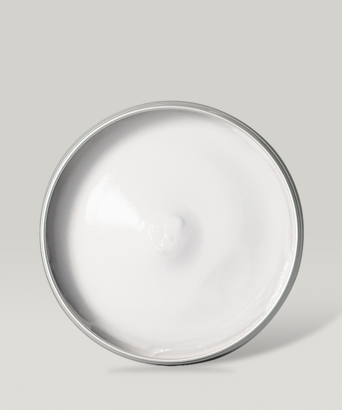 Top view of DONGGUBAT Correct Hand Cream Shea Butter in a silver tin container.