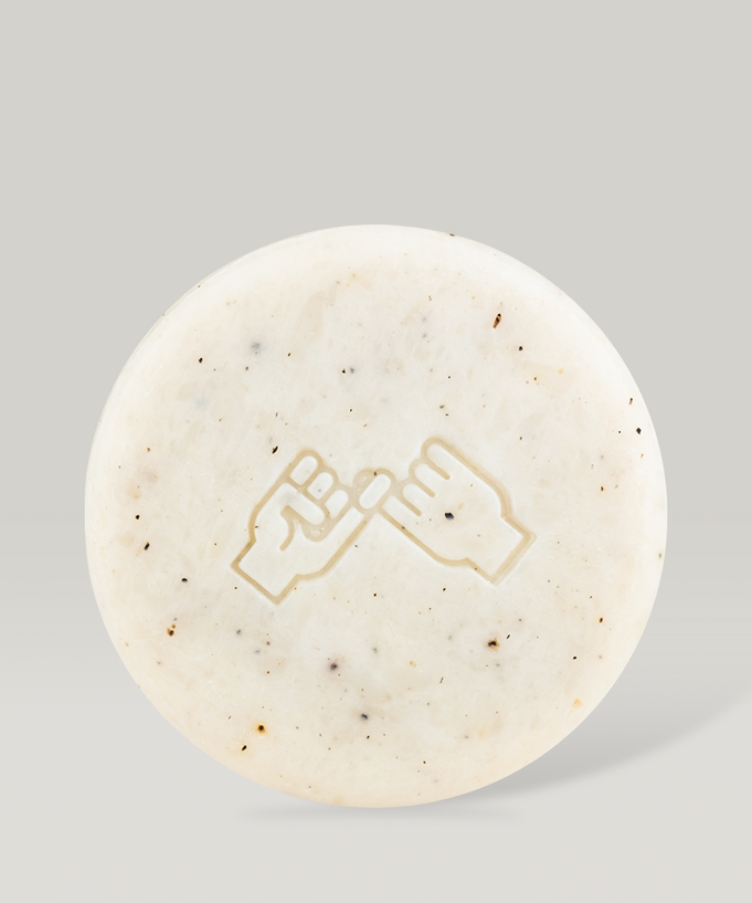 DONGGUBAT Field Correct Body Soap Noni bar with embossed design on a neutral background. Enhance skincare routine with natural ingredients.