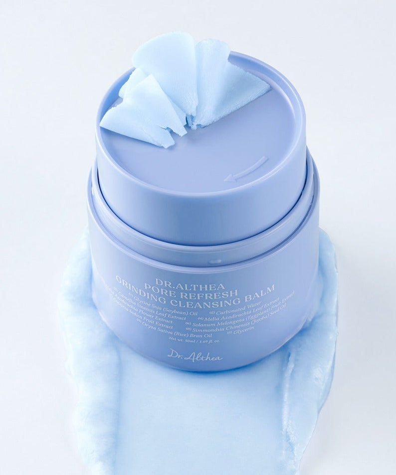 DR.ALTHEA Pore Refresh Grinding Cleansing Balm 50ml in blue jar with lid open, showcasing texture on white background.