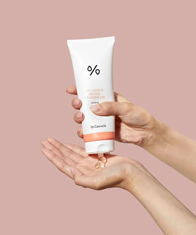 Person applying DR.CEURACLE 5 Alpha Control Melting Cleansing Gel 150ml onto hand.