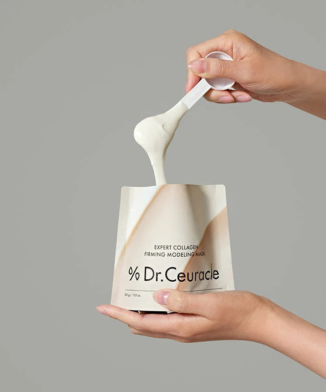 Hands holding and pouring DR.CEURACLE Expert Collagen Firming Modeling Mask 30g