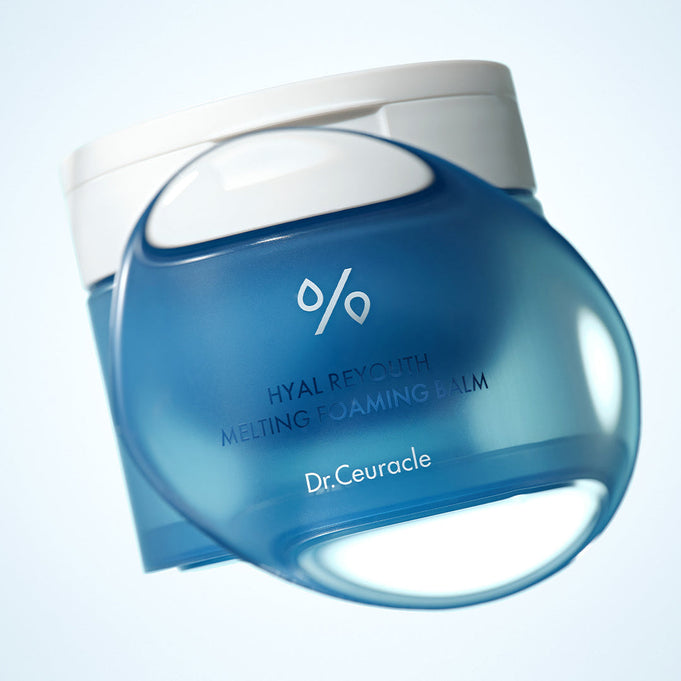 Image of DR.CEURACLE Hyal Reuse Melting Foaming Balm 100ml, a skincare product shown in a blue jar with a transparent balm texture.