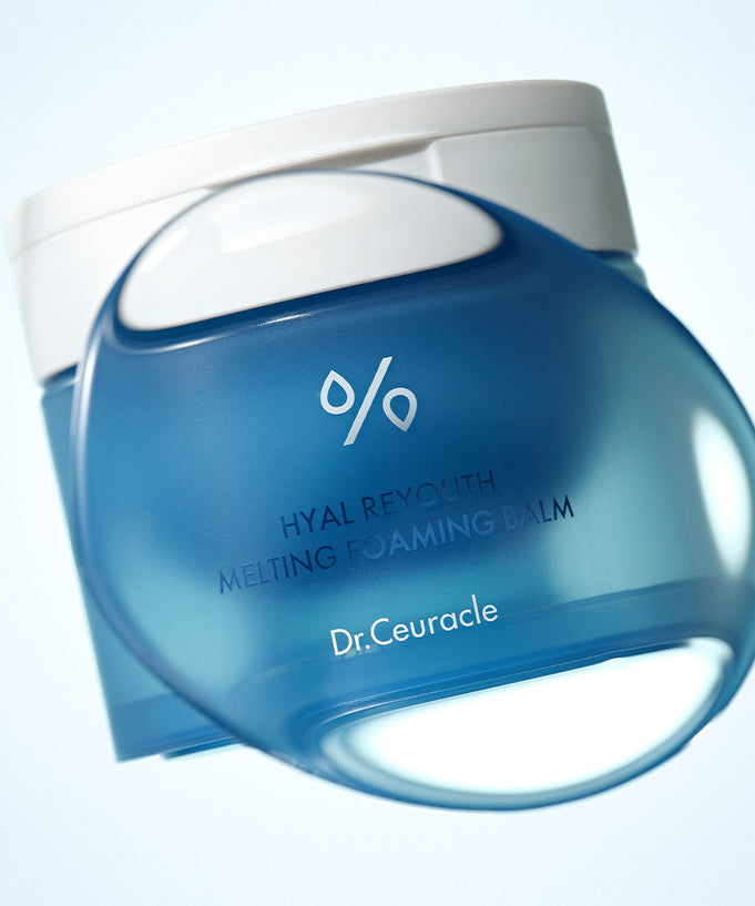 Image of DR.CEURACLE Hyal Reuse Melting Foaming Balm 100ml, a skincare product shown in a blue jar with a transparent balm texture.