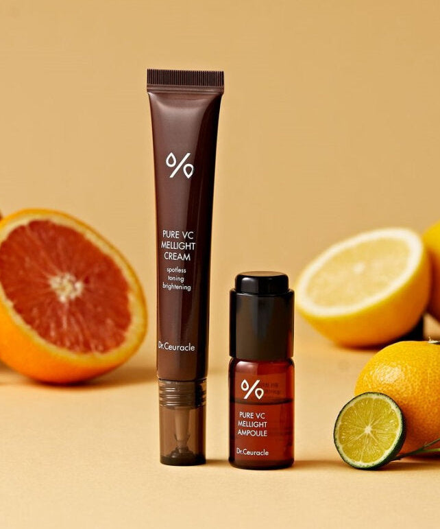 DR.CEURACLE Pure VC Melite Cream 20ml with citrus fruits in the background.