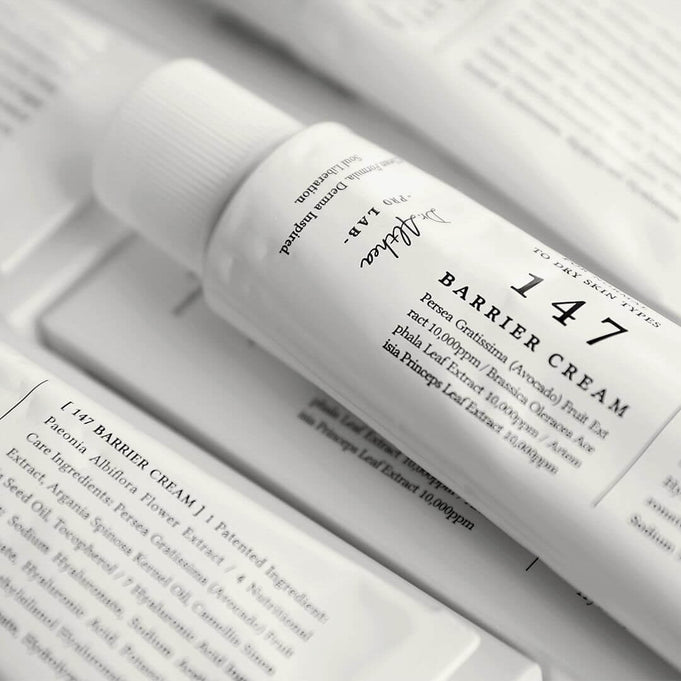 DR.ALTHEA 147 Barrier Cream 50ml tube on a white surface featuring product details and packaging.
