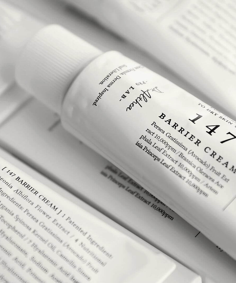 DR.ALTHEA 147 Barrier Cream 50ml tube on a white surface featuring product details and packaging.
