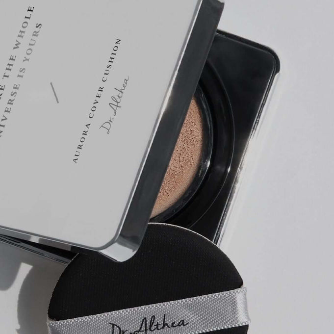 Open packaging of DR.ALTHEA Aurora Cover Cushion 15g on a white background, highlighting the compact design and product branding.