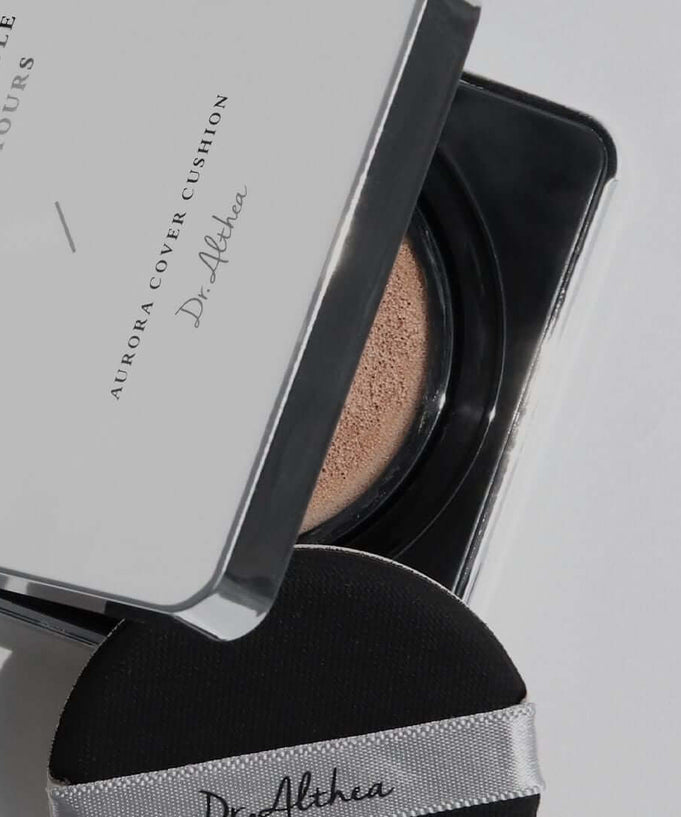 Open packaging of DR.ALTHEA Aurora Cover Cushion 15g on a white background, highlighting the compact design and product branding.