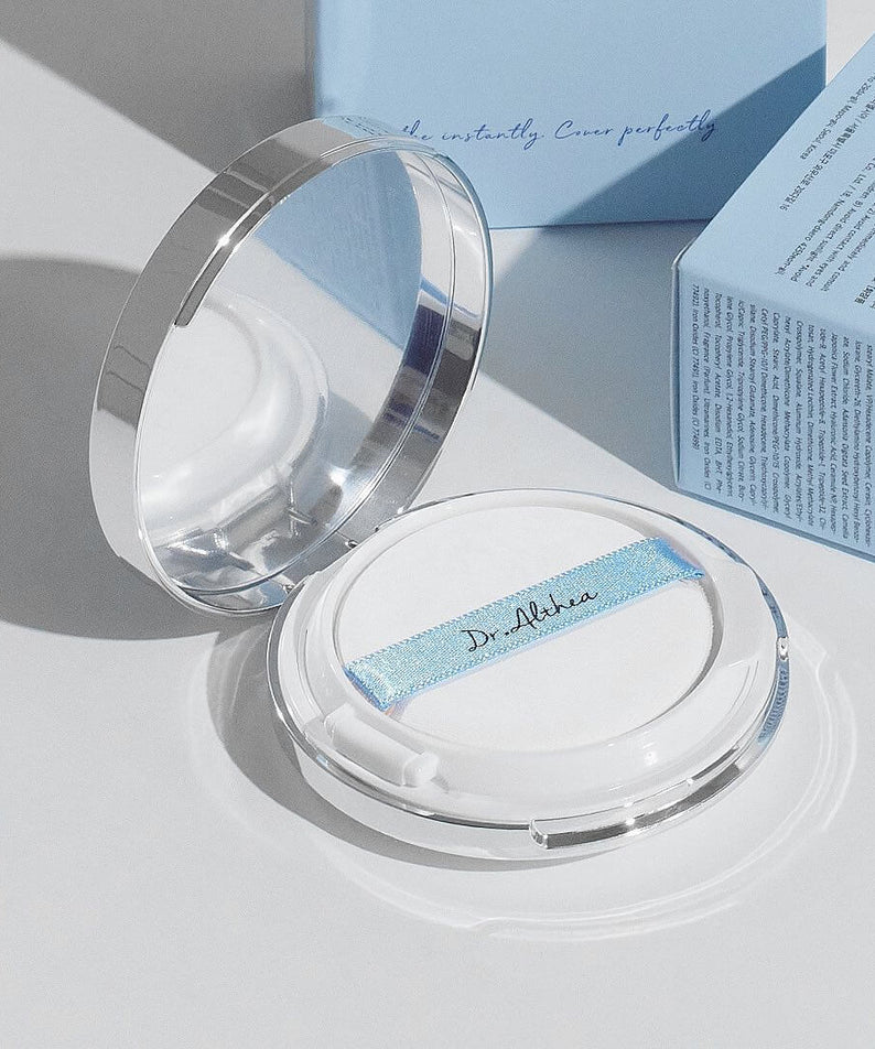 Open compact of DR.ALTHEA Double Serum Night Foundation 12g with reflected light and packaging.