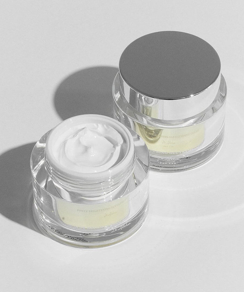 DR.ALTHEA Niathion Cream 30ml in elegant glass jars with silver lids, showcasing the premium skincare product's luxurious texture.