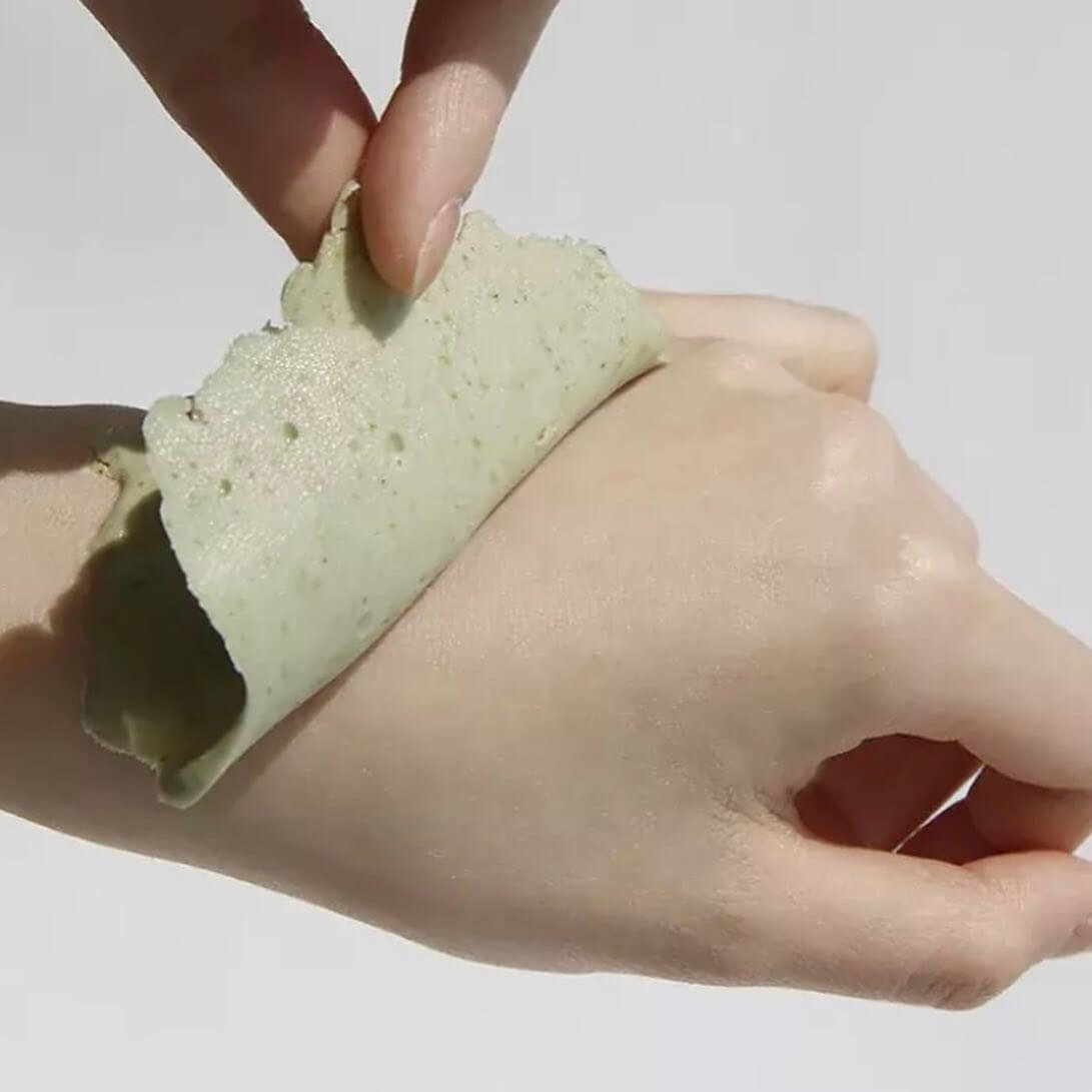 Applying DR.ALTHEA Premium Cica Modeling Mask Set (5ea) on hand for skincare routine