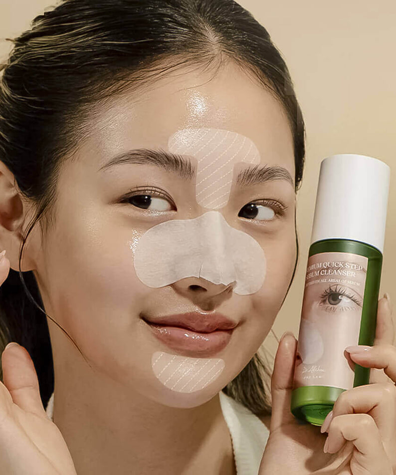 Model using DR.ALTHEA Premium Quick Step Sebum Cleanser 100ml with facial strips applied.