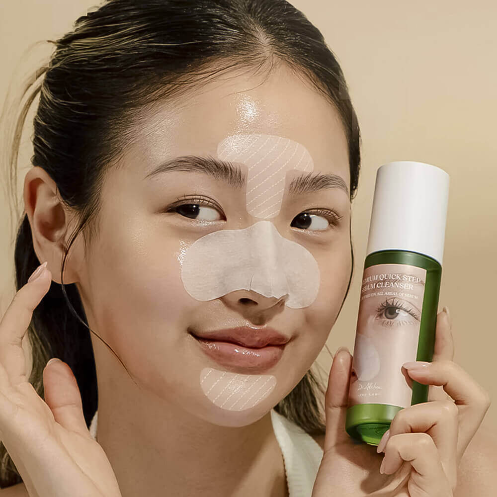 Model using DR.ALTHEA Premium Quick Step Sebum Cleanser 100ml with facial strips applied.