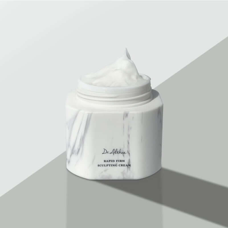 DR.ALTHEA Rapid Firm Sculpting Cream 45ml in open marble jar showcasing the texture of the cream on a minimalist background.
