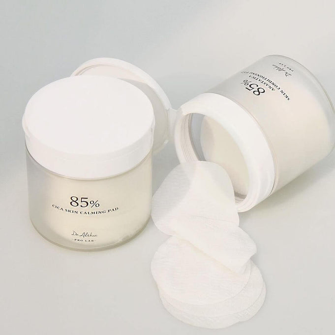 Open jar of DR.ALTHEA Resurrection SKin Conditioning Pad 170g with cotton pads displayed on a light background.