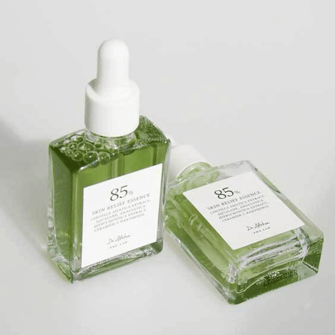 DR.ALTHEA Skin Relief Essence 30ml - Two green bottles displayed on a white surface with dropper caps.