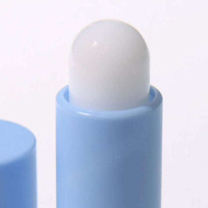 Close-up of DR.ALTHEA Soft Malting Lip Balm in a blue tube, showcasing the smooth balm texture.