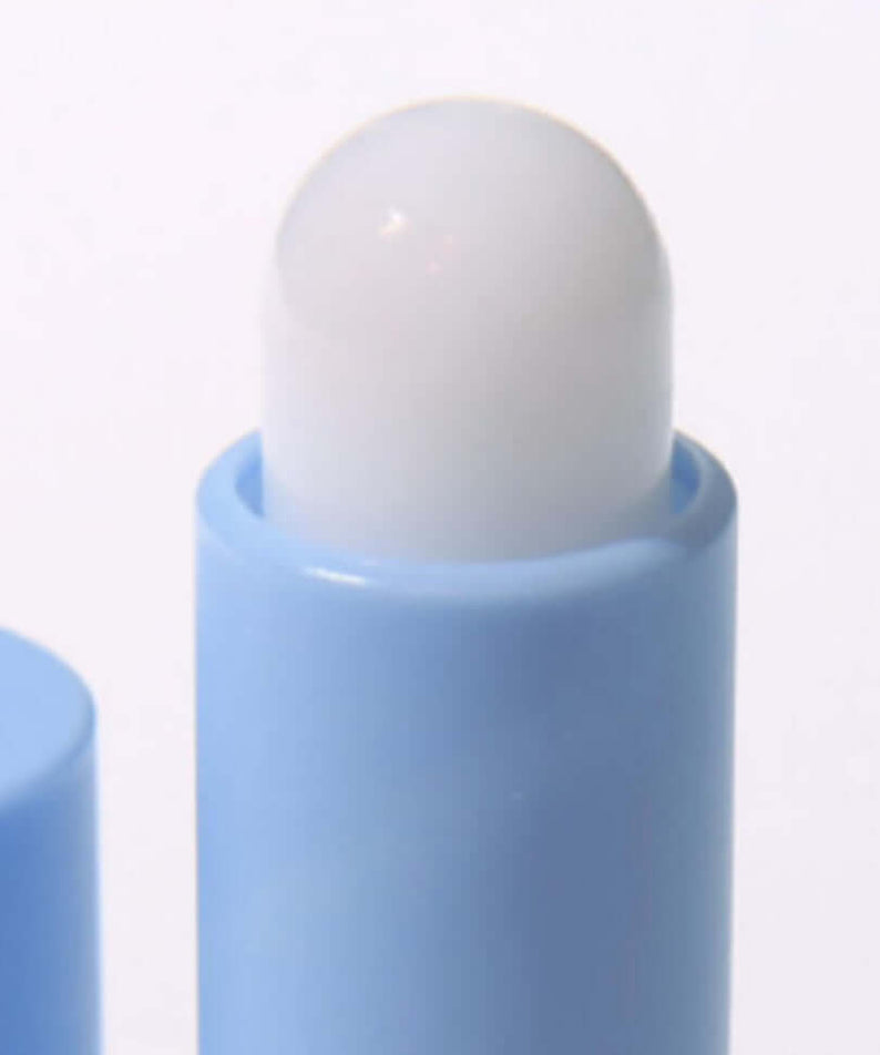 Close-up of DR.ALTHEA Soft Malting Lip Balm in a blue tube, showcasing the smooth balm texture.