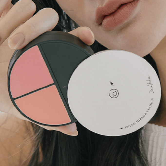 Close-up of DR.ALTHEA Swing Mirror Cushion (Cushion+Lip+Cheek) 15g showing open palette with blush and highlighter shades.