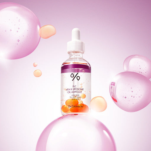 DR.CEURACLE PLC Vita K Liposome Oil Ampoule 50ml with vibrant bubbles and pink background