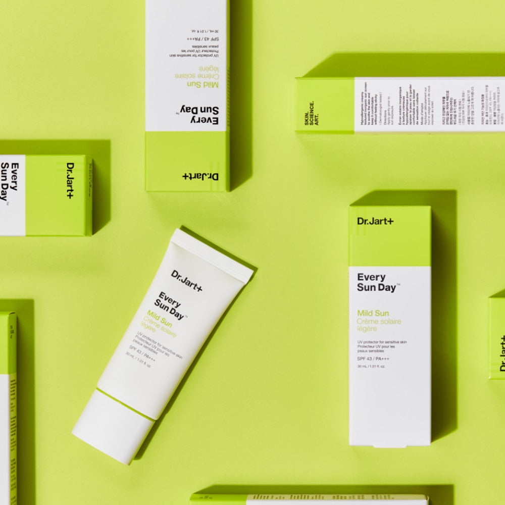 DR.JART+ Every Sun Day Mild Sun 30ml sunscreen tube and packaging over green background