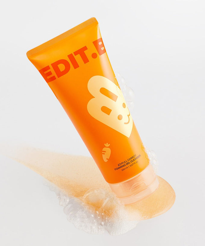 EDIT.B Joyful Carrot Foaming Gel Cleanser 150ml product image with orange packaging and smiling carrot logo.