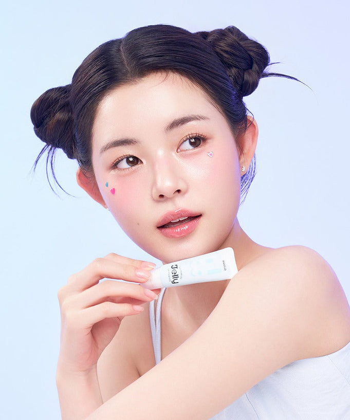 Woman holding EDIT.B Waterful Jelly Lip Essence 11ml, showcasing moisturizing lip care product.