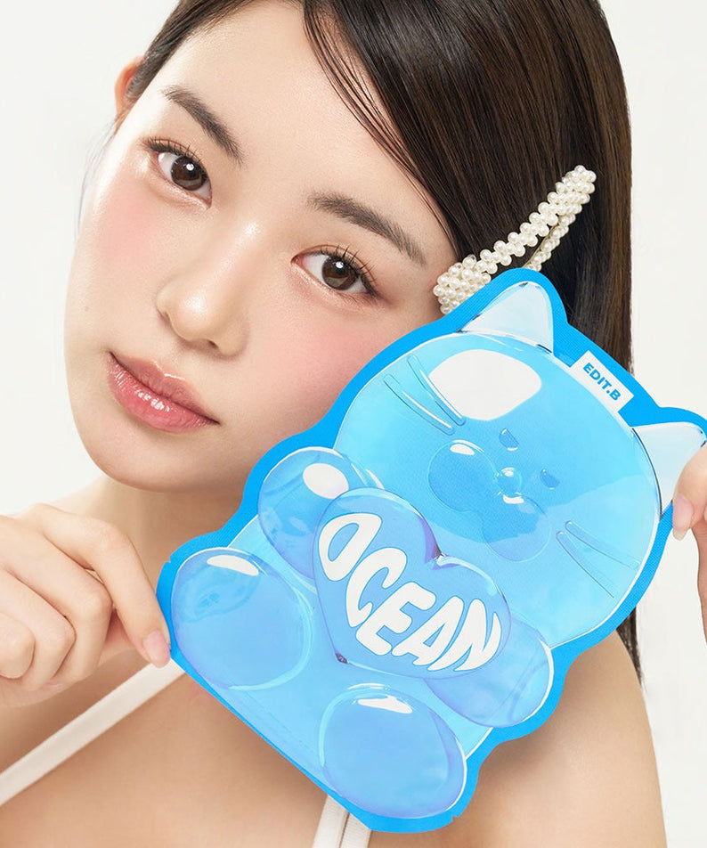 Person holding EDIT.B Waterfull Gumi Mask Ocean packaging.