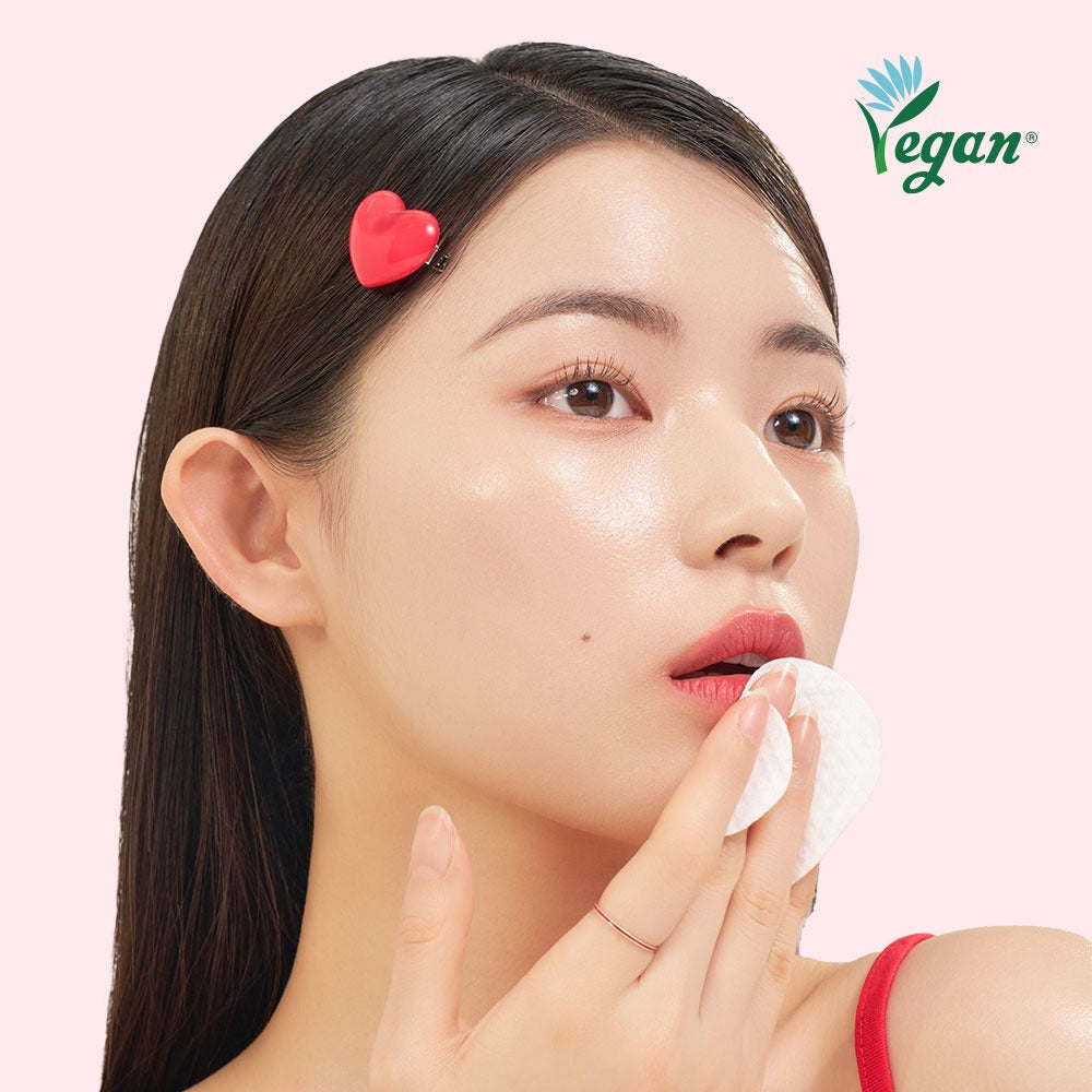 Model using EDIT.B Joyful Heart All-in-One Cleansin Pad 30 Sheets with vegan certification logo
