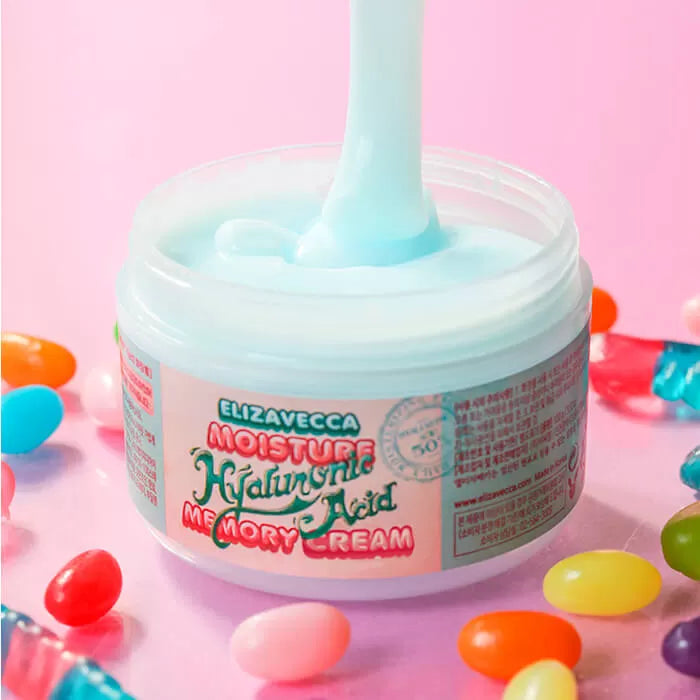 Open jar of ELIZAVECCA Moisture Hyaluronic Acid Memory Cream 100g with colorful background.